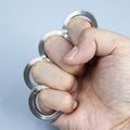 Bague à déclencheur pliable à quatre doigts