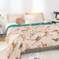 Couverture en coton avec plumes et oiseaux joyeux
