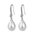 Boucles d’oreilles ovales en perles blanches