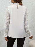 Margit | Blusa con cuello con volantes y mangas transparentes