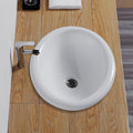 Lavabo empotrado de cerámica blanca con válvula de cierre
