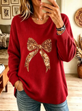 Camisola de malha com motivo de laço com glitter para mulher