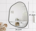 Pebble-shaped wall mirror with metal frame