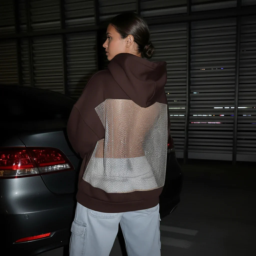 BackStageGlow | Quando le luci si accendono, questa felpa non solo brilla, ma domina lo spazio