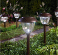 Ensemble de 8 lampes solaires de jardin avec abat-jour en métal et verre transparent